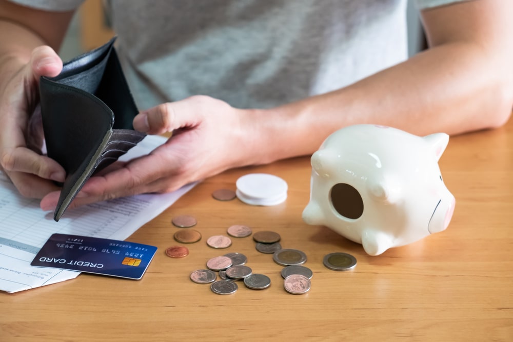 SelectiveFocusAtCreditCardAndWalletMenSitAt