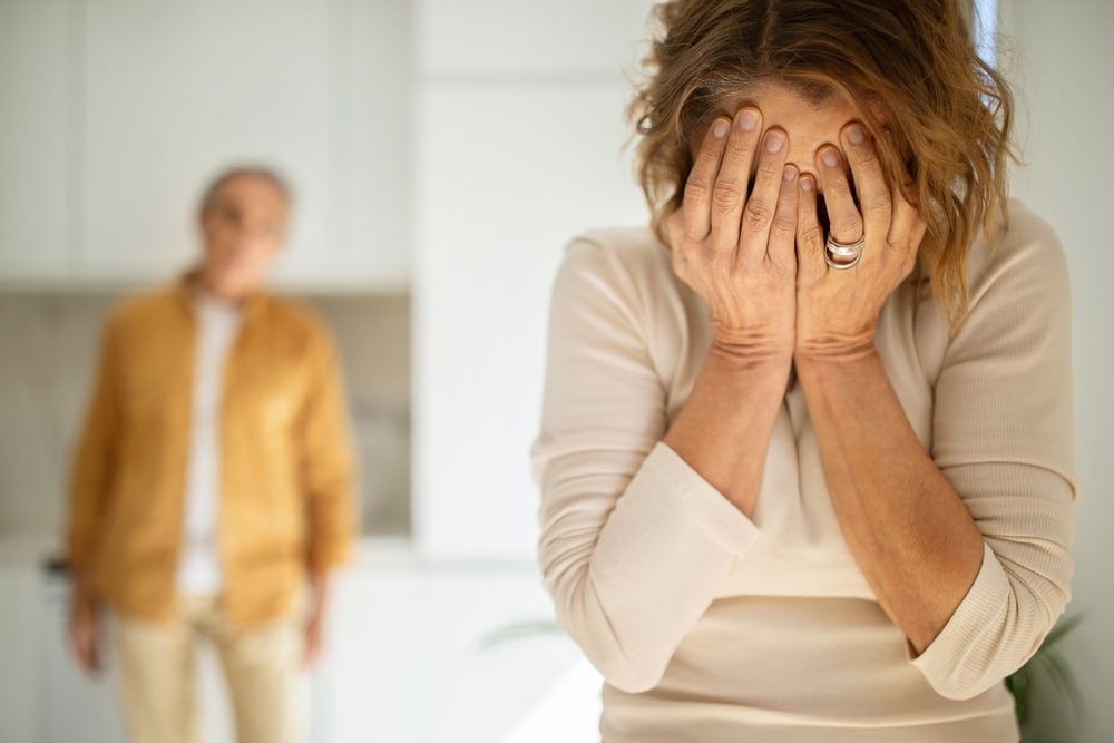 DomesticConflictsConceptSeniorSpousesQuarrelingInKitchenElderlyWoman