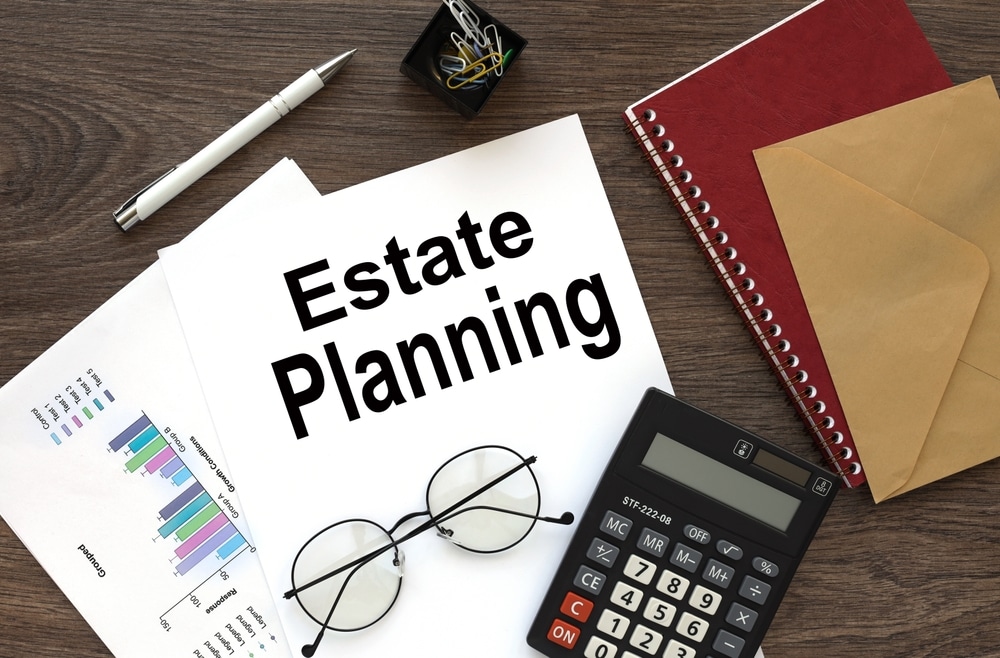 EstatePlanningOnTheWorkDeskThereIsARed EstatePlanningOnTheWorkDeskThereIsARed