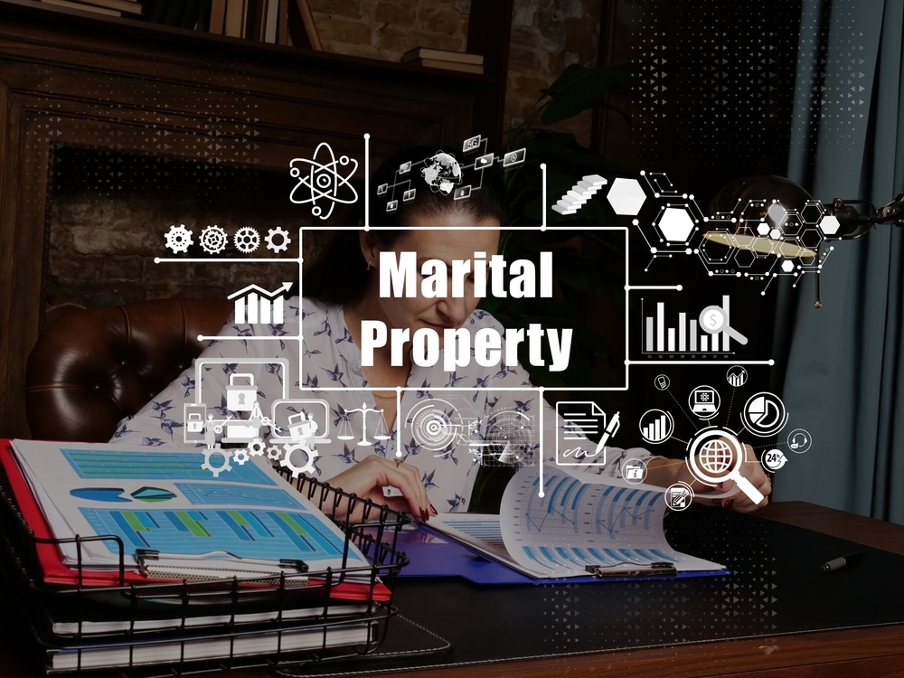 BusinessConceptAboutMaritalPropertyWithSignSeriousYoungBusinesswoman BusinessConceptAboutMaritalPropertyWithSignSeriousYoungBusinesswoman